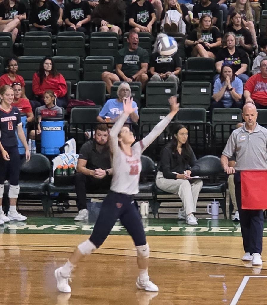 Sidney Sprada serving for UD Volleyball